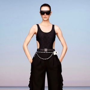 CHANEL Cruise Black Camellia Swimsuit Body Suit
